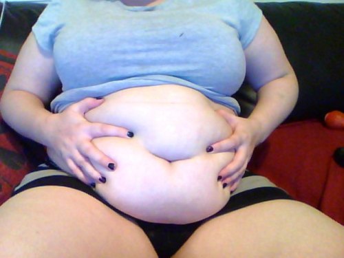 XXX Cradling a very full belly :) Love this old photo