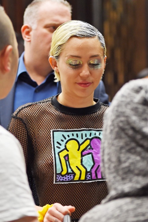 Porn Pics : Miley Cyrus - see-thru shirt out in NYC.
