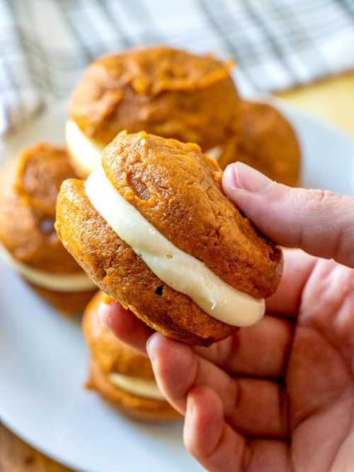 sweetoothgirl:  Pumpkin Whoopie Pies with Maple Cream Cheese Frosting