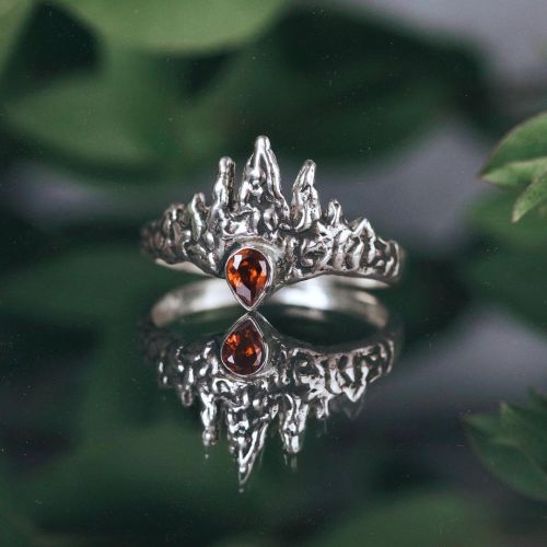 Our sweet Sigma Ocantis Ring looking like a Phoenix rising from the ashes! This was designed to be w