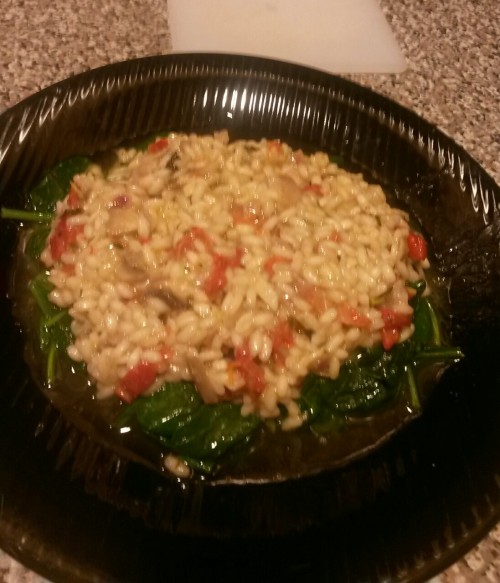 Sun Dried Tomato & Mushroom Risotto over Sautéed Spinach. I start by sautéing chopped red onion 