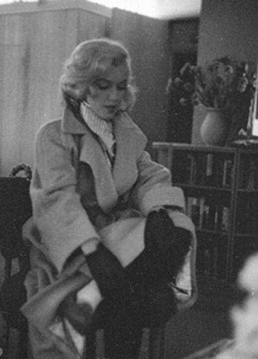 miss-vanilla:Marilyn Monroe - Camel Coat Sitting, 1953. Photographed by Milton Greene.