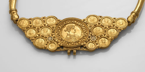 A pectoral made of coins and a medallion featuring Byzantine emperors, ca. 540. The hooks at the bot