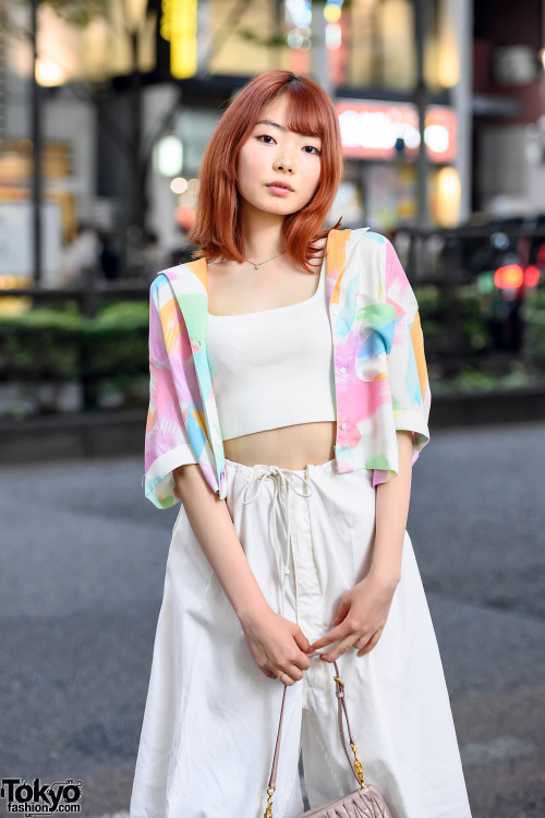 19-year-old Japanese model Uta on the street in Harajuku with an orange hairstyle, a cardigan over a