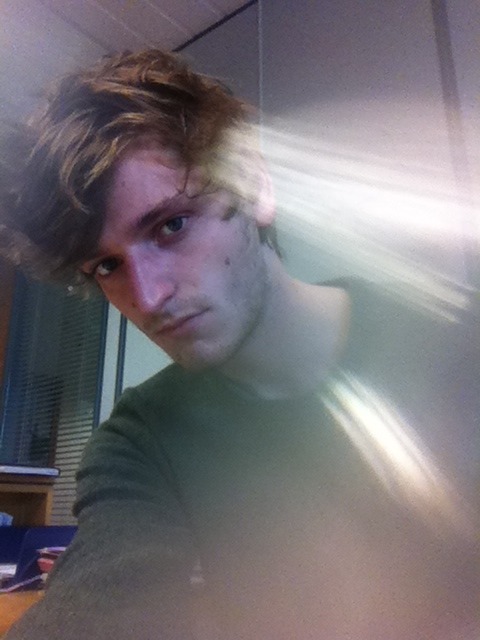 I took a selfie in work and my camera’s really fucked up so it looks odd.