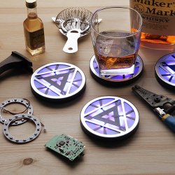 wickedclothes:  Iron Man Arc Reactor Coasters Whether you need a source of clean energy, a powerful bomb, an artificial heart, or a source of power for your very own superior combat suit, these arc reactor coasters have you (and your table) covered. Keep