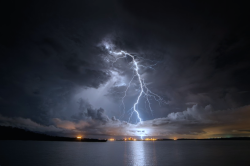 nubbsgalore:  photos by scott h. murray from australia’s northern territory. note the arcing bolt in the third photo, which appears to travel upwards before looping down and to the foreground. 
