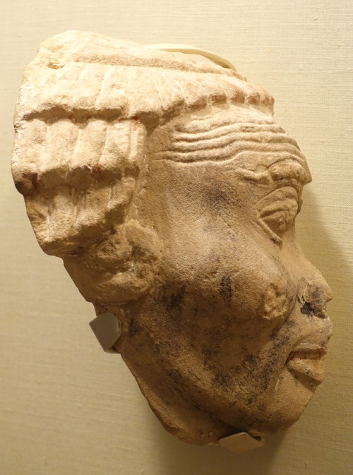Sandstone sculpture of the head of a Nubian captive, from the mortuary complex at Medinet Habu of th
