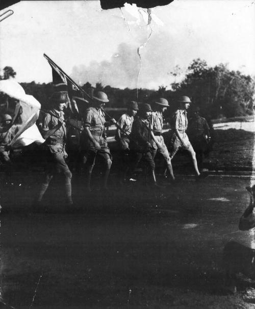 historicaltimes: Lieutenant-General Percival marching to negotiate the largest surrender of British-