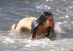 thewomanwatcher:  I love Jennifer Lawrence. Not her acting or her singing mind you, I love her body, and that is all. These nude pictures of her on the beach are incredible.