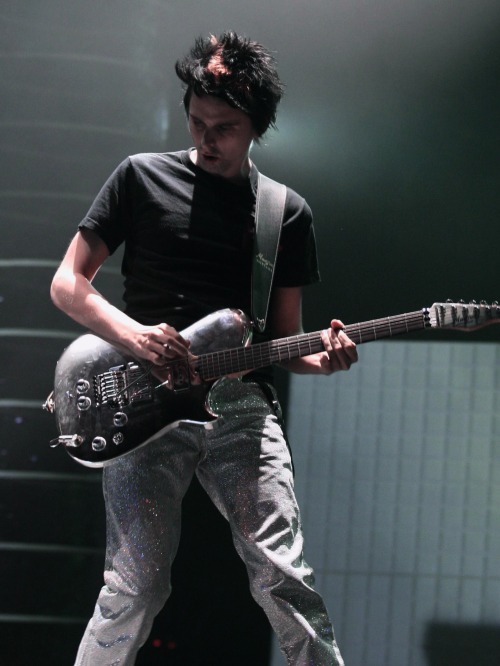 Matthew Bellamy performing at Les Eurockéennes, Belfort, France 2006those pants are covered in holog