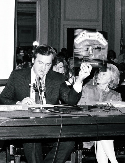 the-young-metal-attack:A representative of the PMRC holds up a Metallica album cover at a senate hearing at Capitol Hill, Washington DC, United States, 19th September 1985. Representatives of the Parents Music Resource Center.