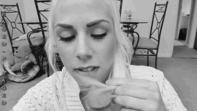 Using her hair to tease