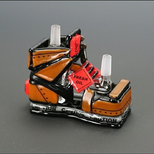 headyhunter: For the sneaker heads, some of the incredible work of glass artist Adam Whobery. I love