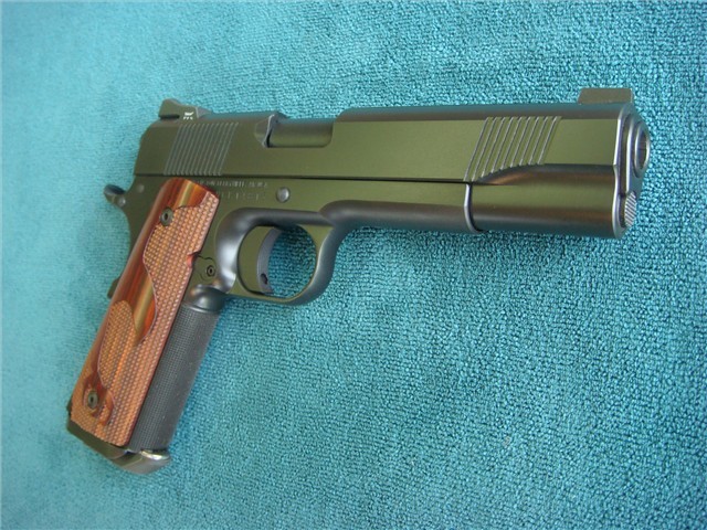 gunrunnerhell:  Nighthawk Talon A high end 10mm Auto 1911. The overall selection