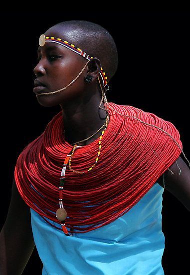 Samburu women of Kenya. Like the Maasai, Samburu women wear beaded necklaces as a sign of wealth. Th