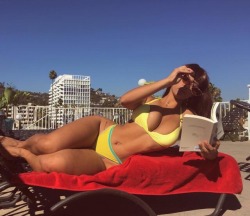 pleasing2theeye: Carmela catchin’ a few rays with a good book 🔥🍰