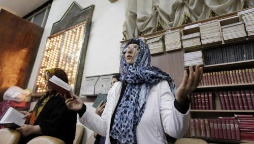 caryophylla:Photos of Iranian Jews in a synagogue in Tehran, Iran, participating in morning and Hanu