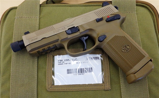 gunrunnerhell:  FNP-45 Tactical As the name implies, the FNP-45 Tactical has several