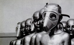  Plastic masks, which are designed to protect their wearers against gas or radioactive particles in the air, are displayed on bronze heads, 1957. 