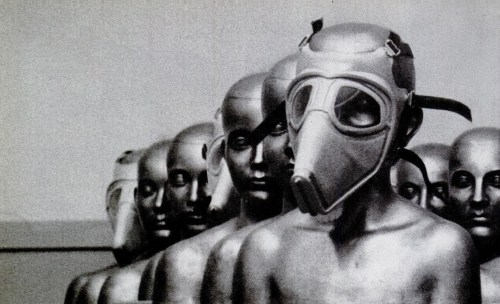 Plastic masks, which are designed to protect their wearers against gas or radioactive particles in the air, are displayed on bronze heads, 1957.