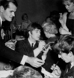 ringodreammer:  John and George signing autographs