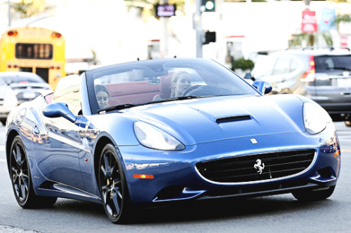 iggyazaleasource:Iggy Azalea spotted in Los Angeles with her ice blue California Ferrari convertible