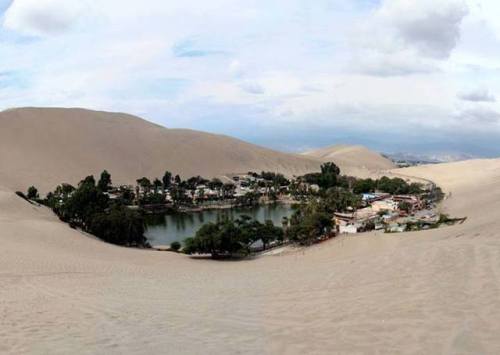 An Oasis in the Desert.In south-western Peru, in amongst the desert landscape, you can find the vill