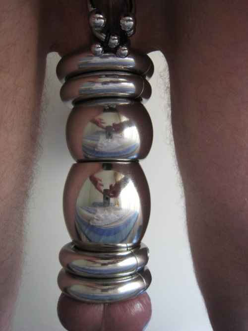 modifiedandstretched:  How to spend the week end ? Here my personal kinky answer ;-) hang 1700g of metal from your scrotum, stretching it for 15cm wear a permanent butt plug, the largest which is suitable for long term wear, this one is the buddy medium
