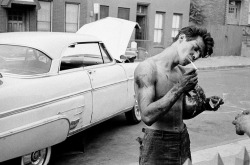 hyacinth-purple:  desaparecidos:  1959, a Greaser works on his car in Brooklyn.    Ooft