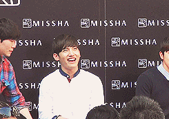 vanitysixx:Changmin’s expression when he saw Kyuhyun’s billboard at the Missha event [fancam 1 &