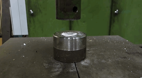 Watch: A Hydraulic Press Causes A Piece Paper Folded 7 Times To Explode Into Pieces.