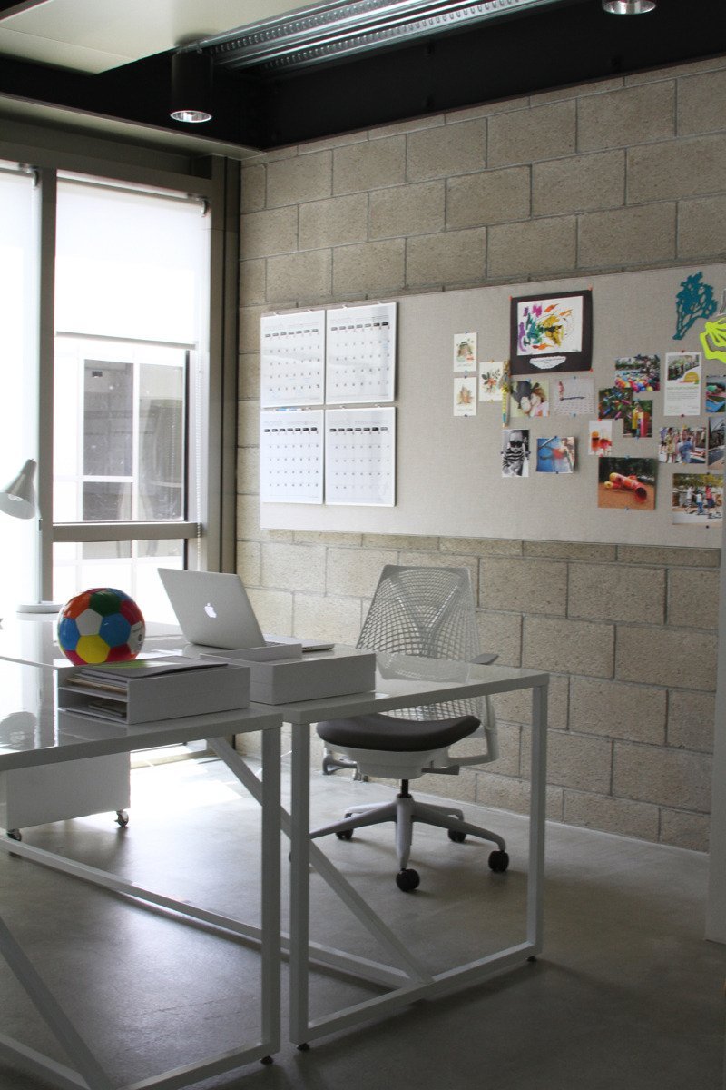 A workspace inside of Crafting Community, a family branding company, and Karen Kimmel Inc, art, design, and creative consulting