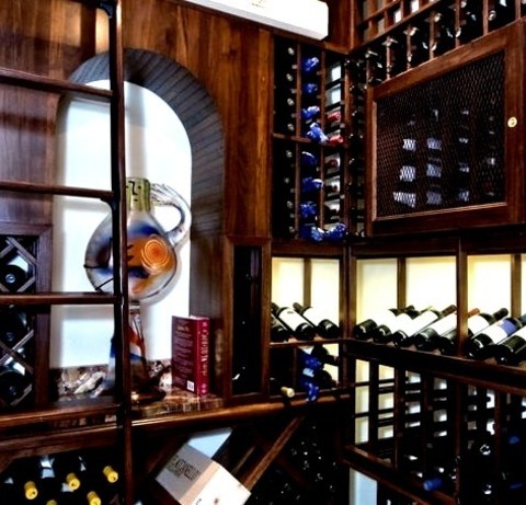 Traditional Wine CellarWine Cellar - Large Traditional Ceramic Tile Wine Cellar Idea With Display Racks