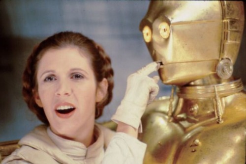 draigasx:Carrie Fisher behind the scenes as Princess Leia.More of Carrie Fischer, as Leia, in THE ou