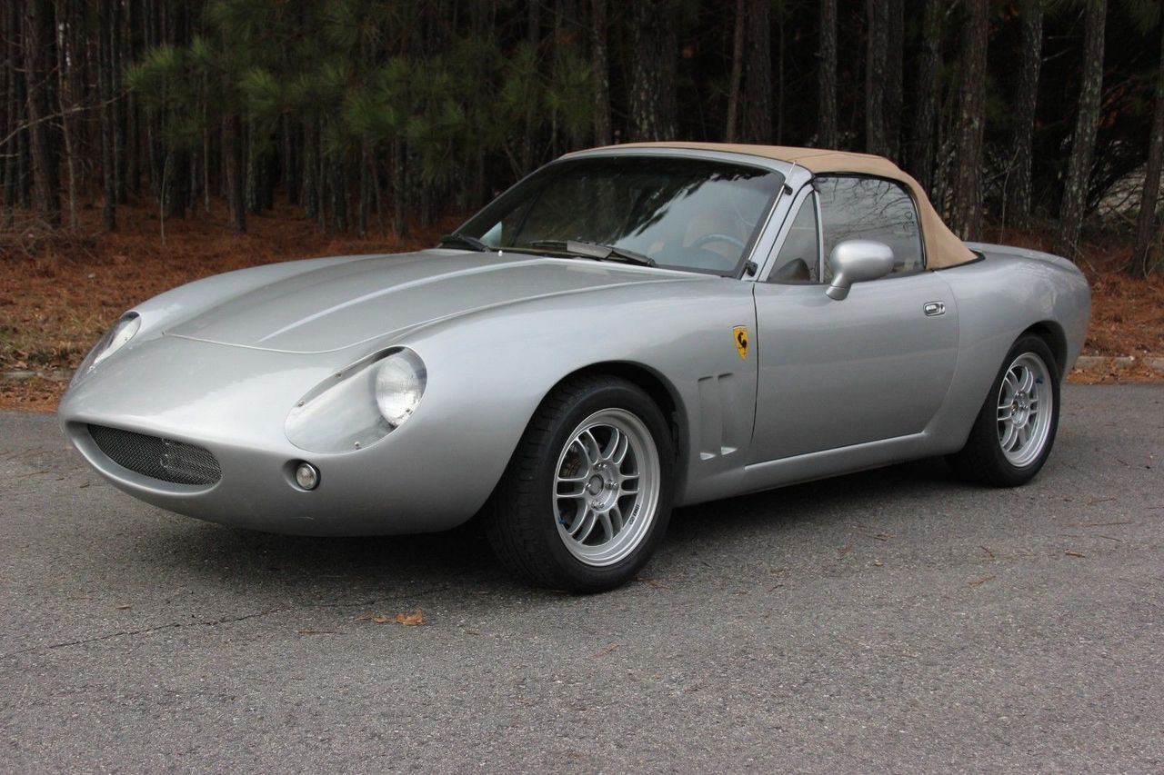 awesomecarmods:  Mazda miata but with a very well done (imo) supercar style bodykit.