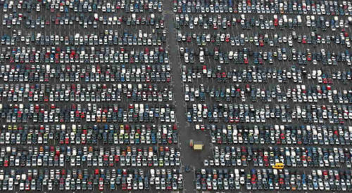 sciencevevo:mansfrombelow:canadian-communist:Where the World’s Unsold Cars Go to Die Above are pho