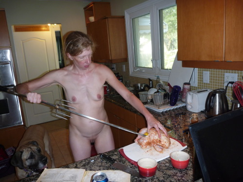 dudenopants:  Kris nude working on dinner, the dog was really hoping the chicken would fall off the 