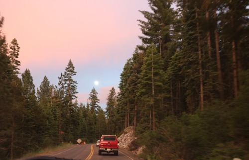 nuhstalgicsoul: The moon kept us company on our drive through the mountains