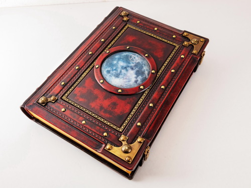 10" x 14" large, aged reddish leather journal. Rich decorated, based on one older version&