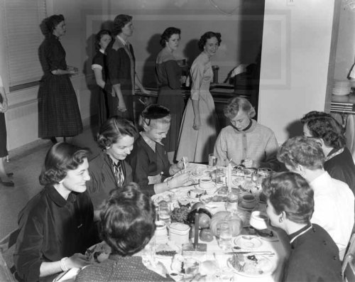 Happy Turkey Day, folks! Here is a photograph from 1955 of Thanksgiving dinner in the dining room of