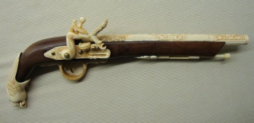 Decorative “flintlock pistol” carved from ivory