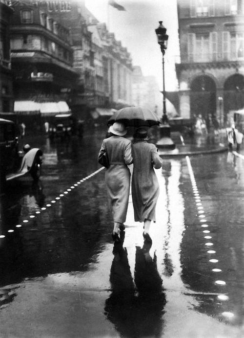 fewthistle:Friends: Parisian rain. August 1934.Photographer: Unknown (via Gamma-Keystone Collection/