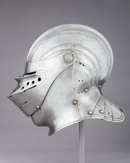 A lovely fluted Closed Sallet in Maximilian style,Height: 11.5 in/29.2 cmWidth: 9.4 in/23.8 cmDepth: