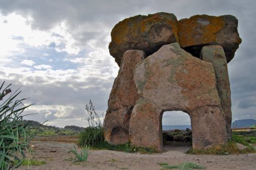 centuriespast:The Dolmen di Sa Coveccada, an ancient megalithic grave, in Sardinia, Italy.Credit…Bet