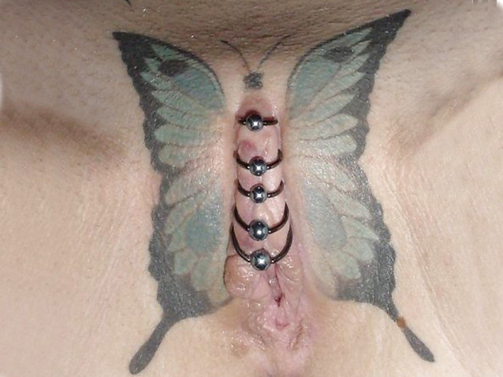 Tattoo and pussy closed by rings form a good example of the frequently used butterfly