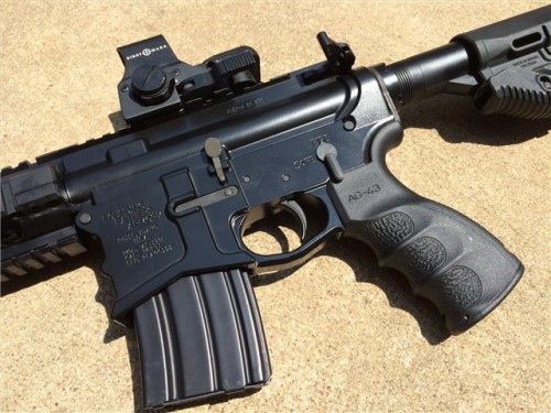 gunrunnerhell:  Beowulf 50 A custom built AR-15 chambered in 50 Beowulf. The factory gas block from Alexander Arms tends to be a bit bulky, making it difficult to conceal under a longer handguard. Interesting but probably more practical choice that the