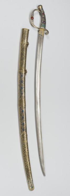 Ornate saber decorated with silver, turquoise, cornelian, colored glass, and enamel, Bukhara, Year o