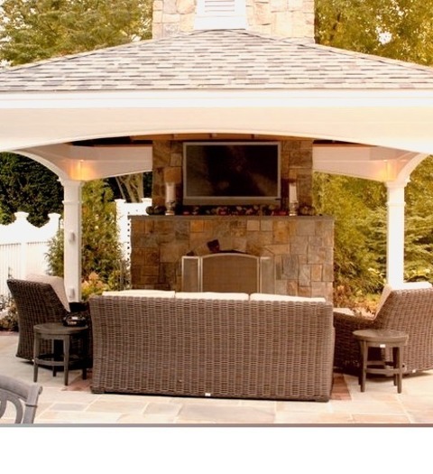 Farmhouse Patio In New Yorka Sizable Stone Patio In The Backyard Of A Farmhouse With A Fire Pit And A