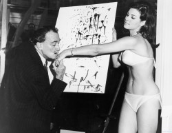 Collectivehistory:  Salvador Dalí Kisses 25-Year-Old Raquel Welch’s Hand In Front